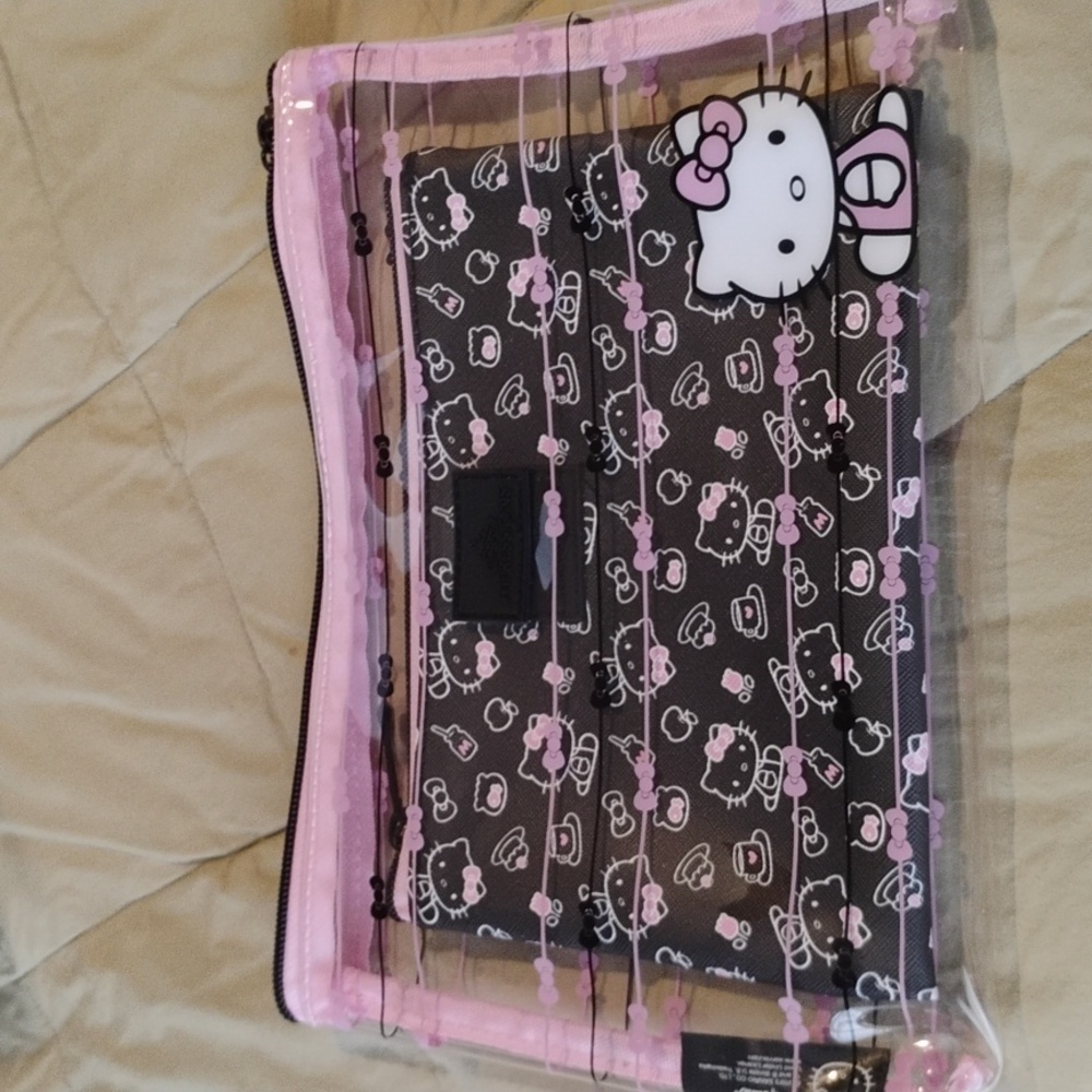 HELLO KITTY DOUBLE POUCH set NWOT .
